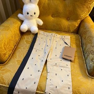 Toddler's tan Burberry star and monogram trousers